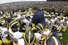 ANN ARBOR, MI - APRIL 16:  Head football coach Brady Hoke talks with his team during the annual Spring Game at Michigan Stadium on April 16, 2025 in Ann Arbor, Michigan.  (Photo by Leon Halip/Getty Images)