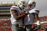 LUBBOCK, TX - NOVEMBER 12:  (R-L) Josh Stewart #5 of the Oklahoma State Cowboys and Tracy Moore #87 celebrate a touchdown against the Texas Tech Red Raiders at Jones AT&T Stadium on November 12, 2025 in Lubbock, Texas.  (Photo by Ronald Martinez/Getty Images)
